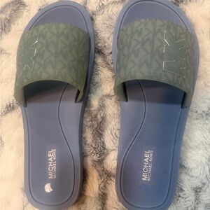Michael Kors Two-Tone Slides in Light Blue rubber sole.